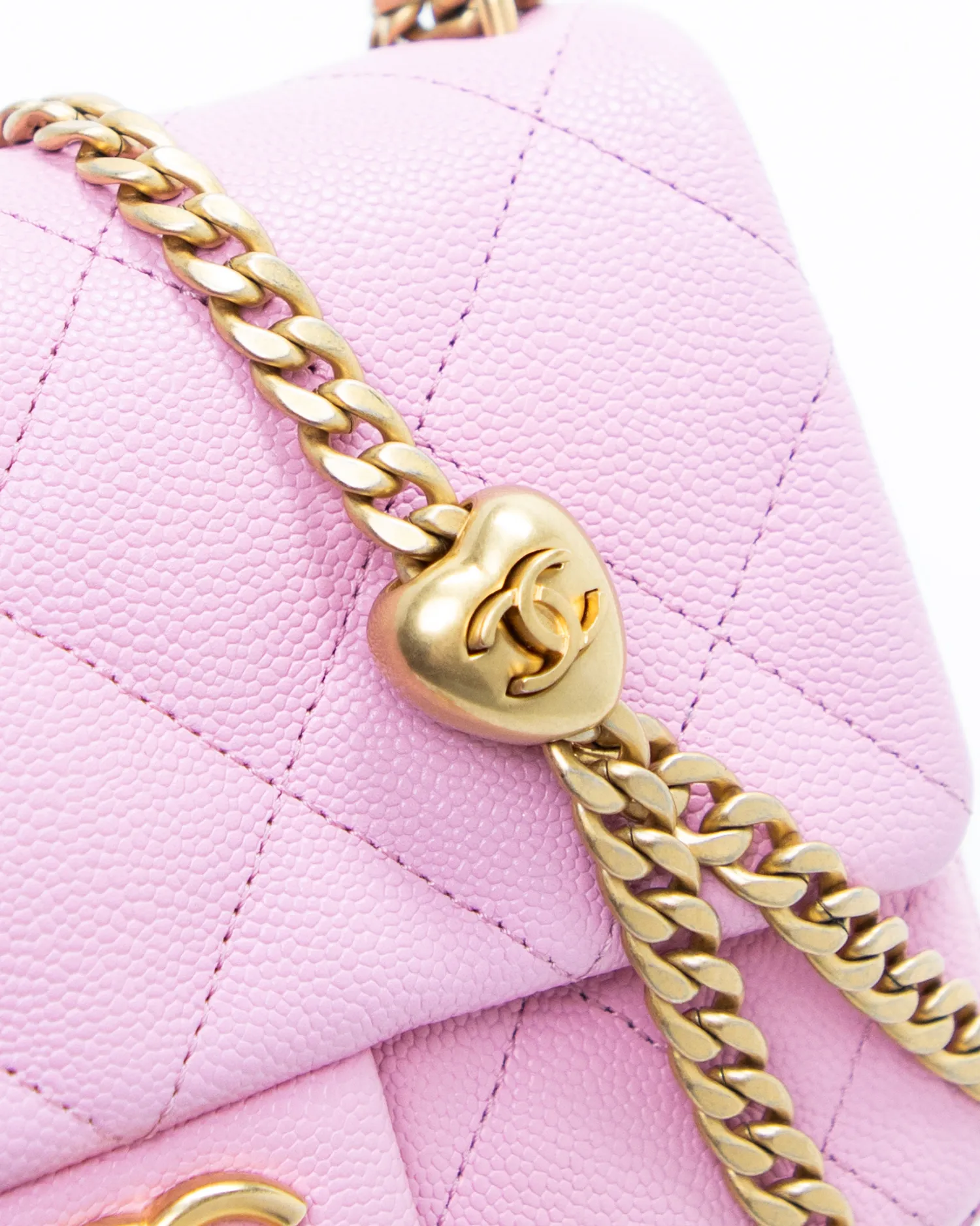 Caviar Quilted Sweetheart Mini Flap Bag