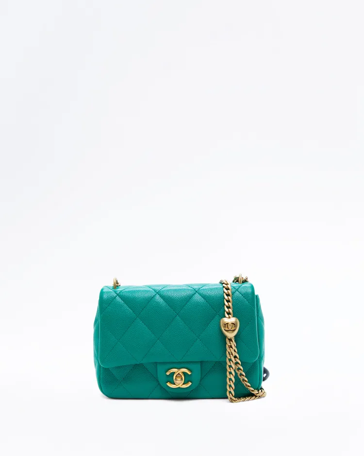 Caviar Quilted Sweetheart Mini Flap Bag