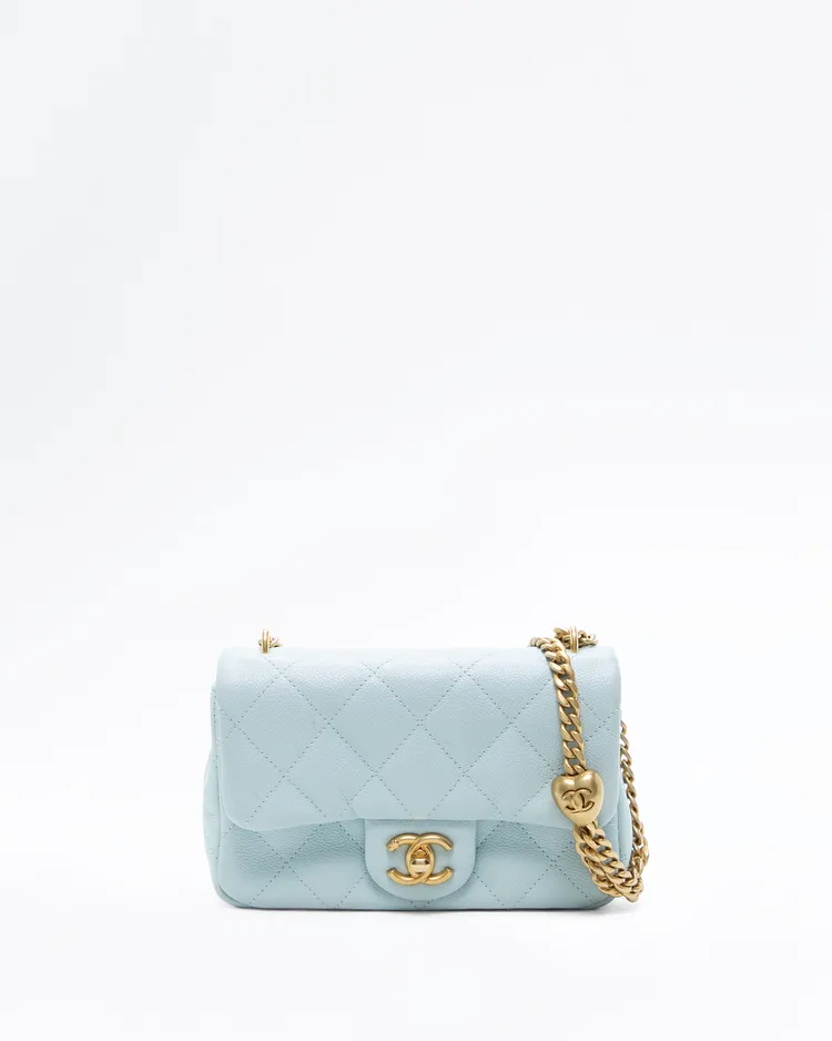 Caviar Quilted Sweetheart Mini Flap Bag