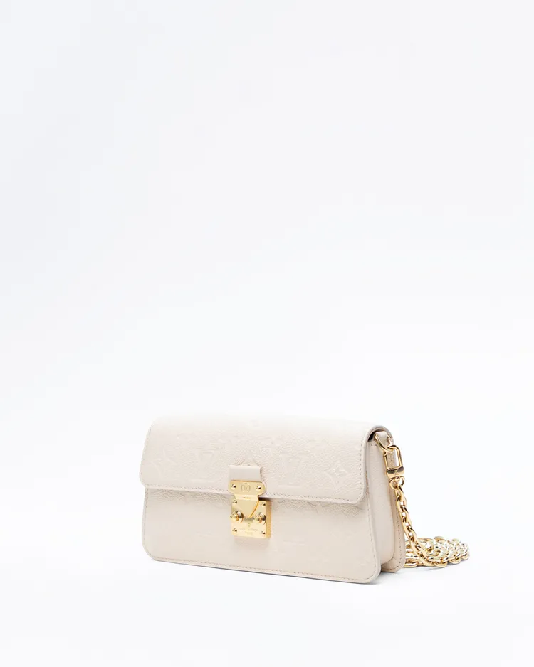 Alternate view angle of Monogram Empreinte Metis Wallet on Chain